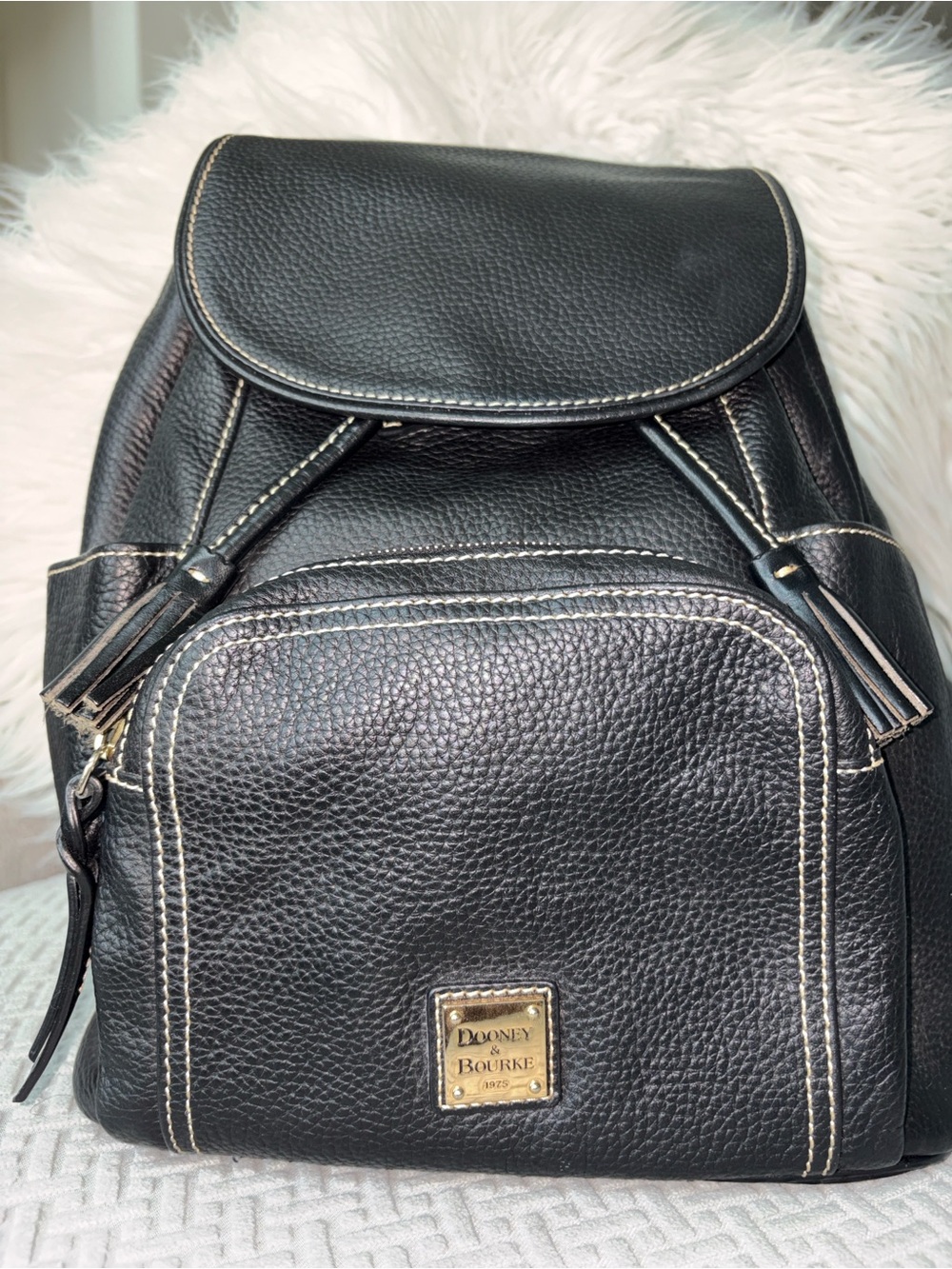 Dooney & Bourke Black leather backpack with red interior